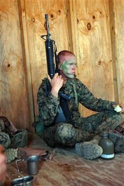 Marine Recruit Refuels After Obstacle Course Training