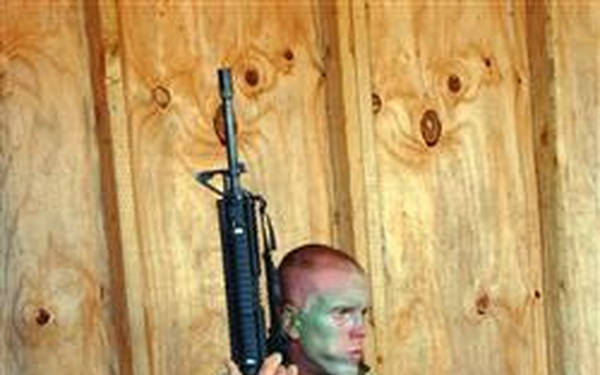 Marine Recruit Refuels After Obstacle Course Training