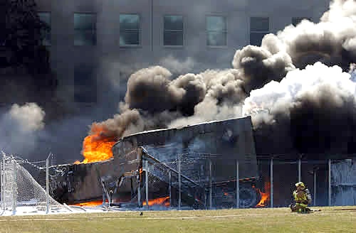 Firefighters Battle Blaze After Jetliner Crashes Into Pentagon on 9/11