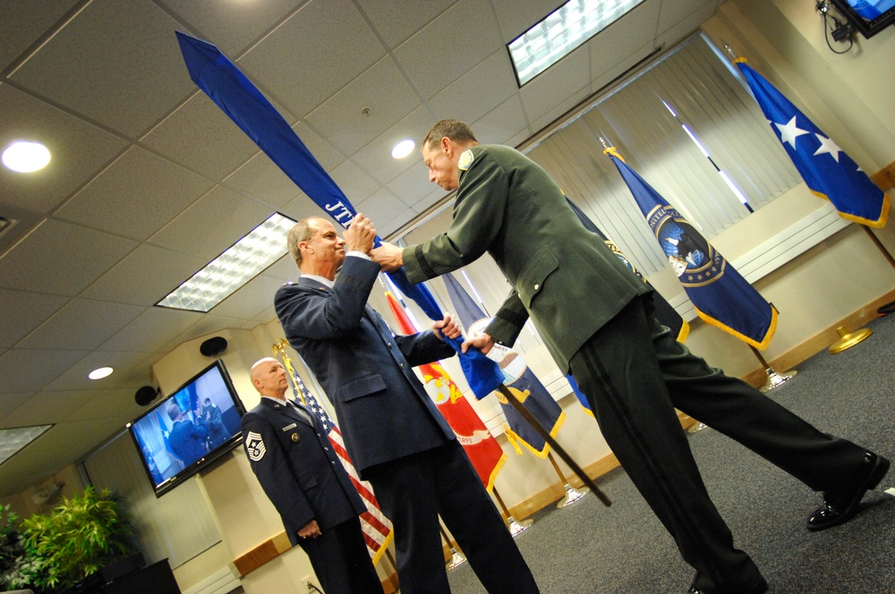 Defense Information Systems Agency Director Passes Colors to U.S. Strategic Command Commander