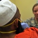 U.S. Soldier Provides Medical Care to Detainee at Parwan Detention Facility
