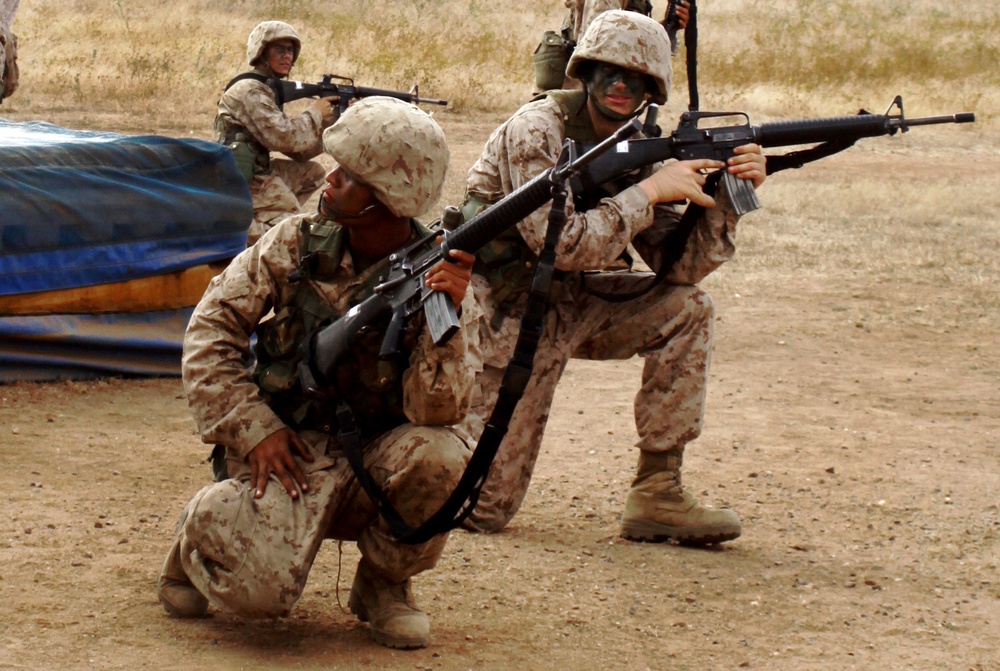 Marine Recruit Practices Obstacle Course Maneuvers