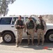 Retired Army Maj. Ed Pulido Poses with Noncommissioned Officers in Iraq