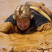 Army Ranger Trainee Crawls Through Mud at Fort Benning