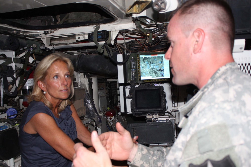 Dr. Jill Biden Tours Stryker Combat Vehicle with Army Sgt. Jed Glover in Iraq