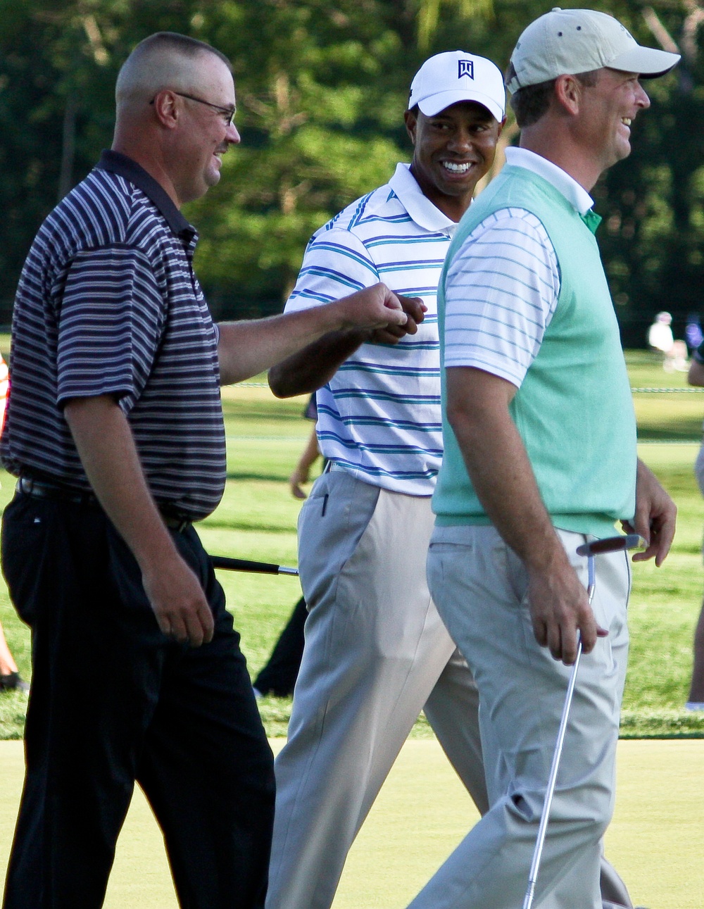 Tiger Woods Celebrates Birdie Putt with Air Force Chief Master Sergeant at AT&amp;T National Pro-Am