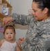 Army Spouse Cares for Children While Husband Serves Elsewhere