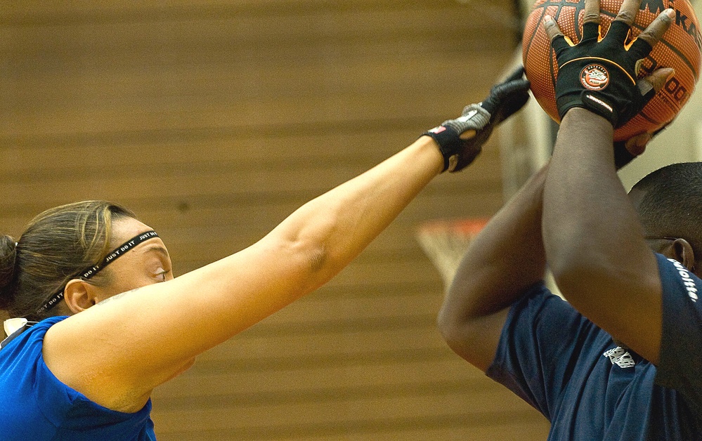 Navy Basketball Player Looks for Open Teammate in Wheelchair Basketball Game