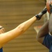 Navy Basketball Player Looks for Open Teammate in Wheelchair Basketball Game