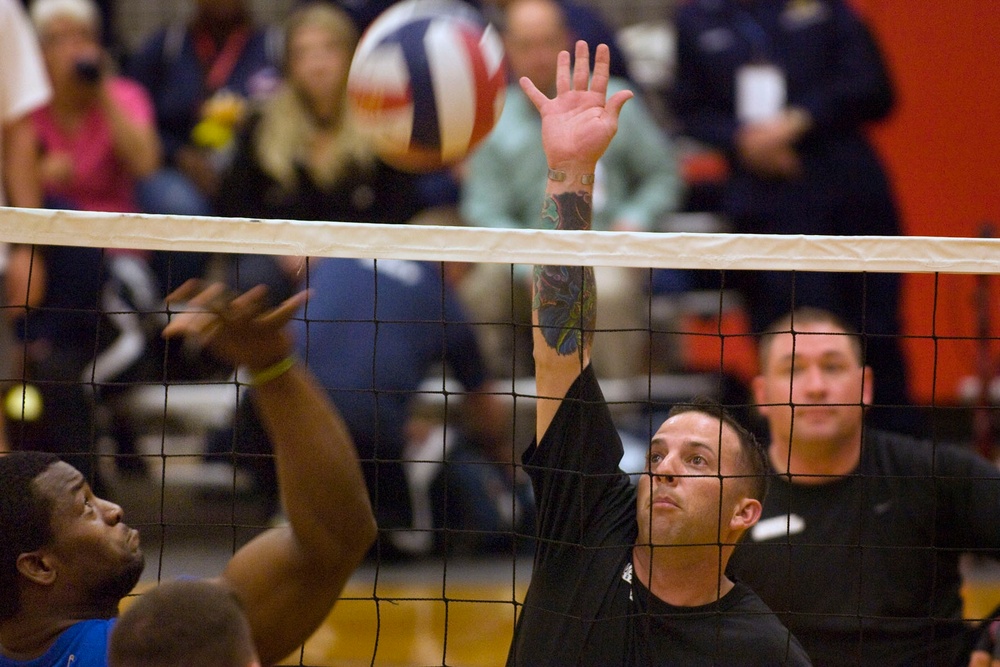 Sgt. Robert Price Blocks Volleyball Shot at Warrior Games
