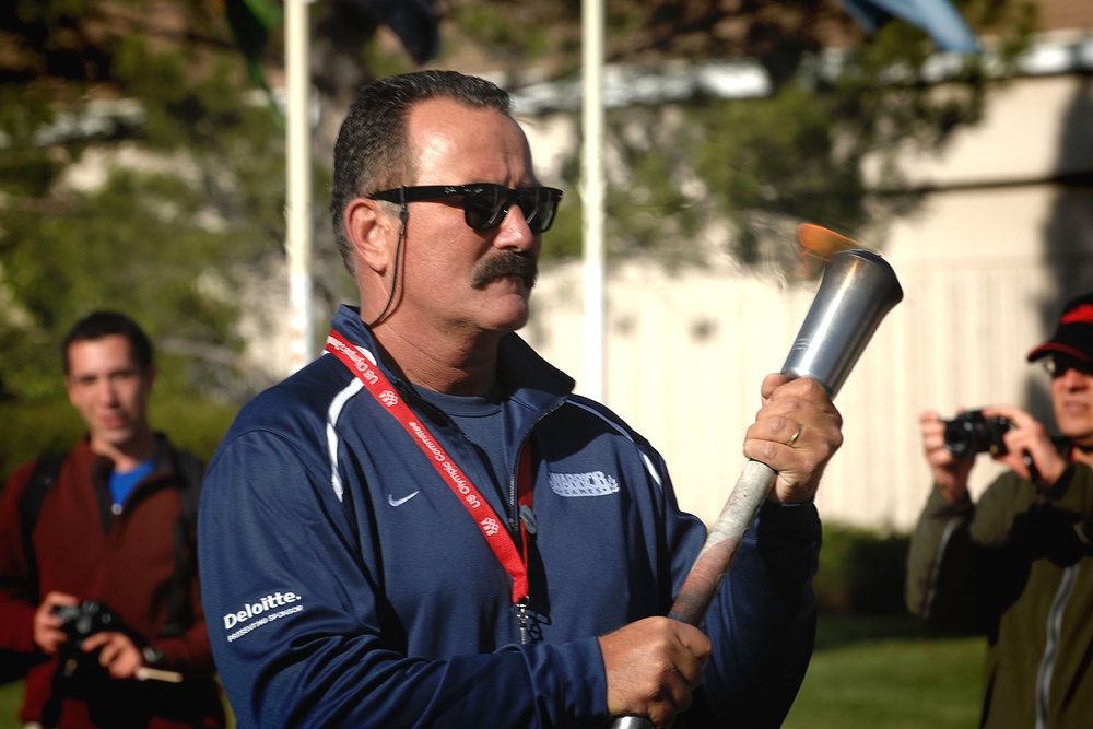 Navy Master Chief Petty Officer Carries Torch at Inaugural Warrior Games