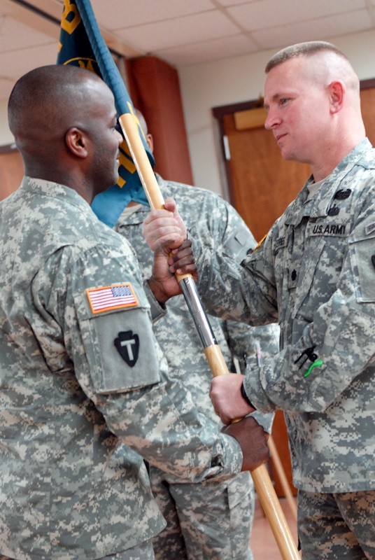 Army Captain Accepts Unit Flag in Change of Command Ceremony