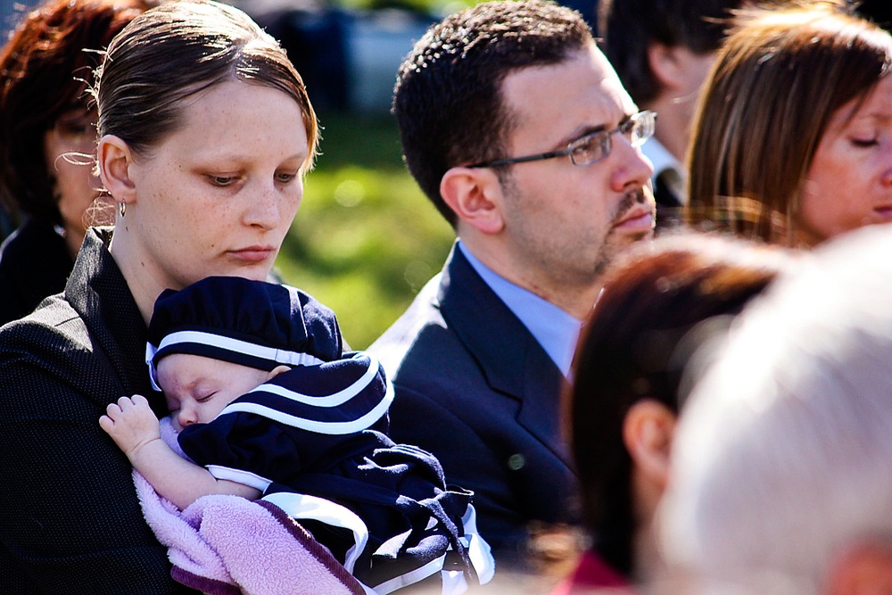Widow and Daughter Honor Fallen Military Medic at Arlington Ceremony