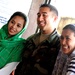Army Sgt. Poses with Health Workers in Philippines