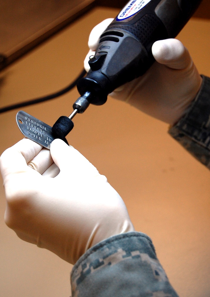 Honoring the Fallen: Air Force Mortuary Specialist Cleans Dog Tags