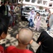 Girl Teaches Dental Hygiene at Philippines Clinic