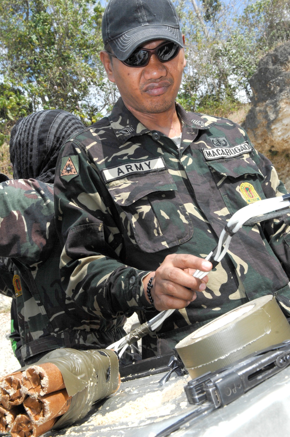 Philippine Soldier Prepares Dynamite for Controlled Detonation