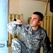 Army Sgt. Inspects Black Hawk Helicopter in Iraq