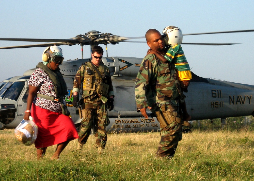 U.S. Navy Sailor Rescues Haitian Boy After Earthquake