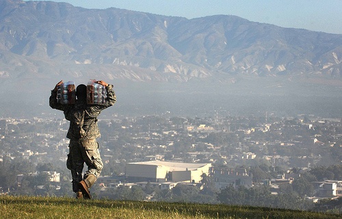 Soldier Delivers Water to Earthquake Victims in Haiti