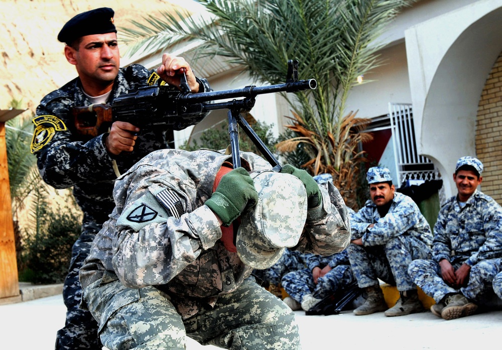 U.S. Troops Train Iraqi Police on Weapons Handling