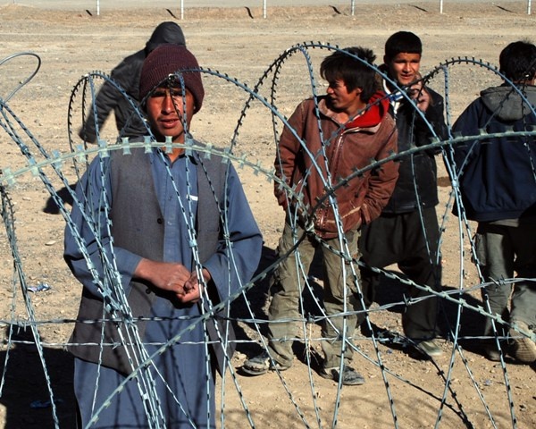 Afghan English Teacher Speaks with U.S. Soldiers in Bamyan Province