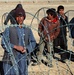 Afghan English Teacher Speaks with U.S. Soldiers in Bamyan Province