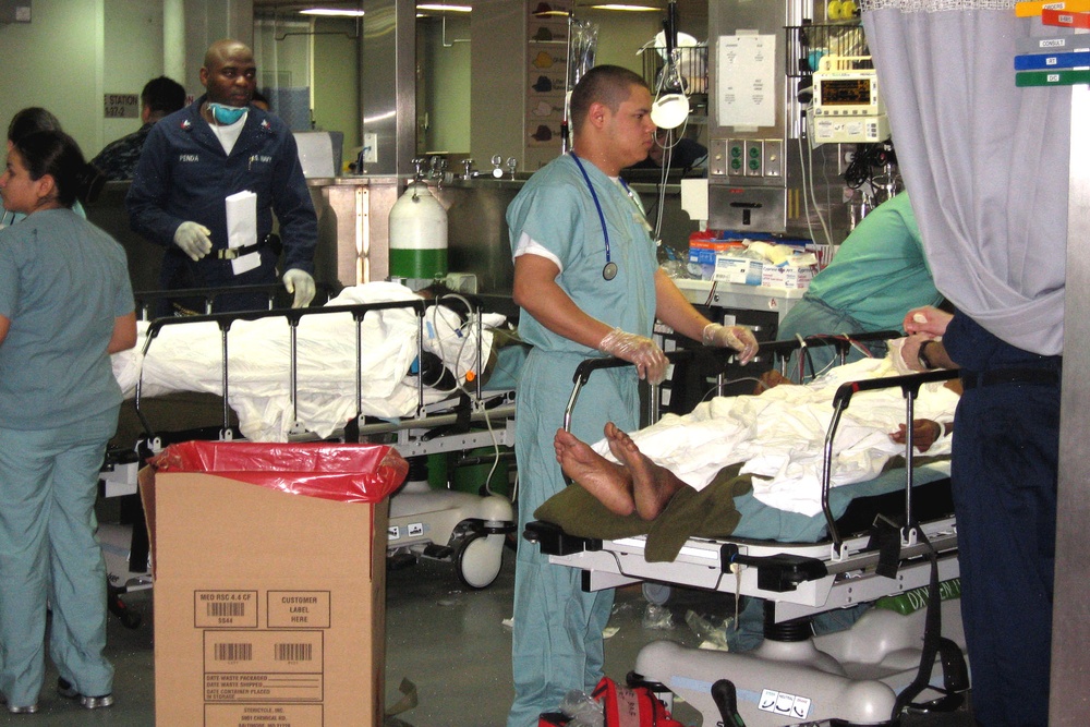 Medics Aboard USNS Comfort Assess Haitian Patients Before Arrival in Port-au-Prince