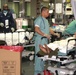 Medics Aboard USNS Comfort Assess Haitian Patients Before Arrival in Port-au-Prince