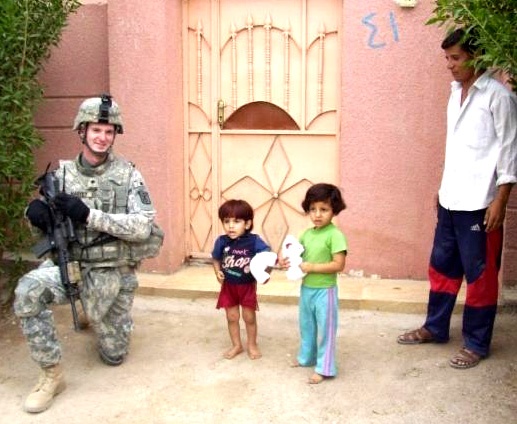 U.S. Soldier Brings Joy to Iraqi Children with Stuffed Animal Giveaway