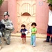 U.S. Soldier Brings Joy to Iraqi Children with Stuffed Animal Giveaway