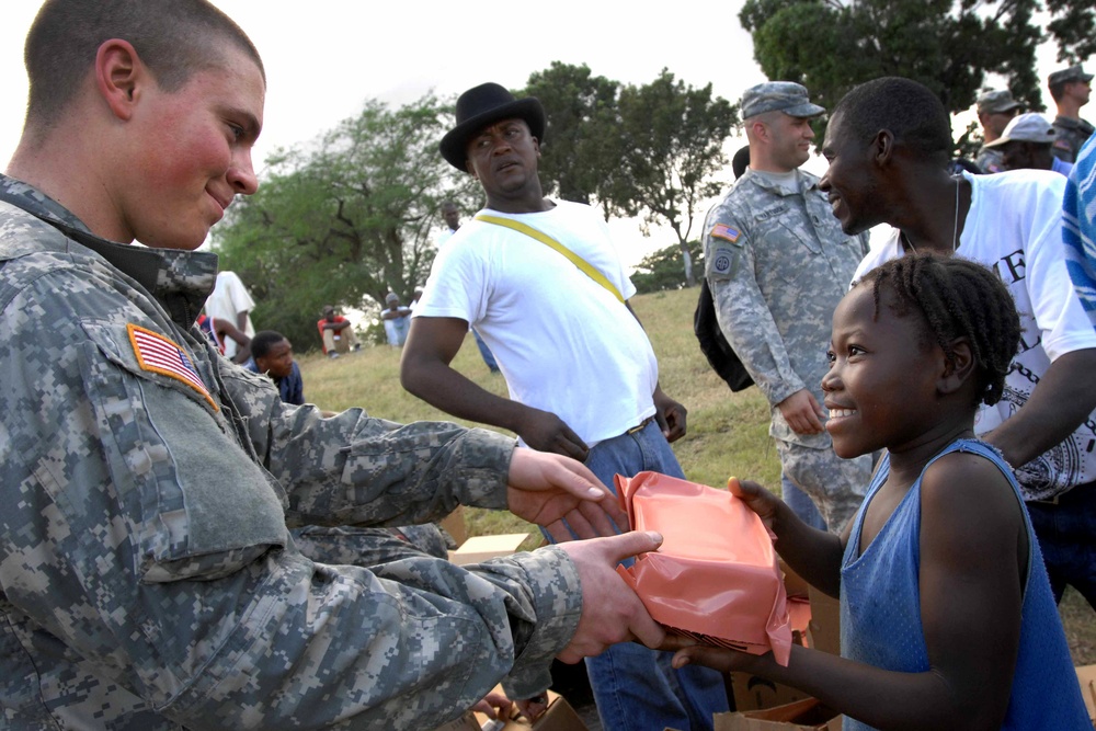Soldiers Provide Aid to Haitian Civilians After Earthquake
