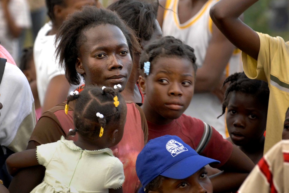 Troops Distribute Meals to Haitians in Port-au-Prince