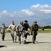 Air Force Airmen Evacuate Injured in Haiti Earthquake Relief Effort