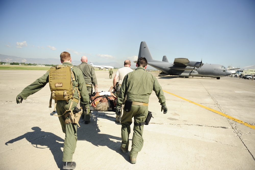 U.S. Airmen Evacuate Injured Haitian After Earthquake