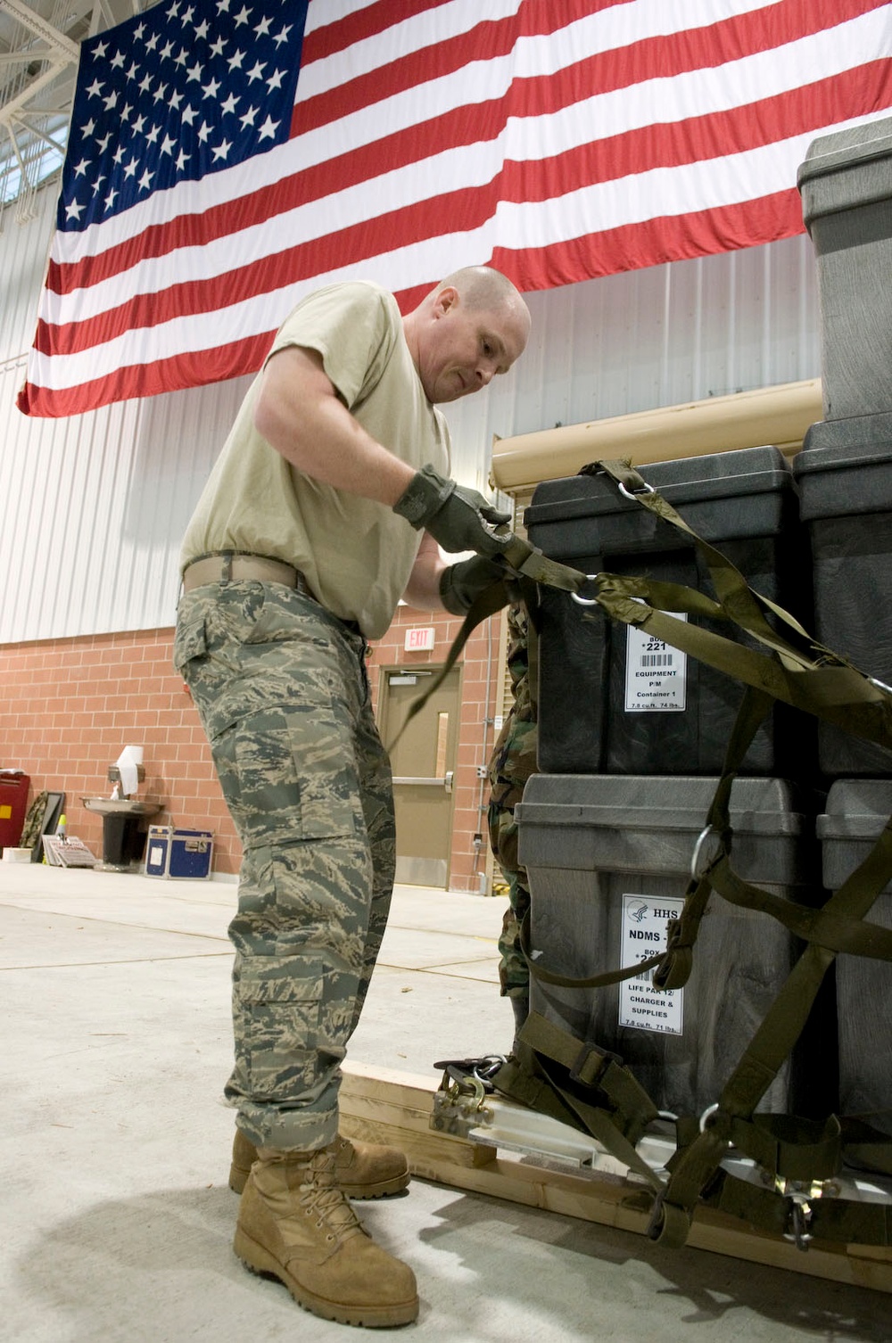 Air Force Airman Prepares Vital Supplies for Haiti Earthquake Relief