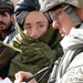 Army Sergeant Engages with Afghan Villagers During Reconstruction Effort