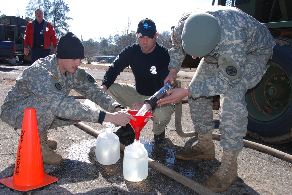 Alabama National Guard Soldiers and Local Firefighters Provide Water to Thomasville Residents After Freeze
