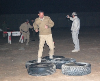 Border Enforcement Academy Student Navigates Obstacle Course in Iraq