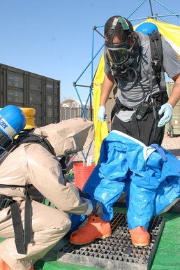Soldier Undergoes Decontamination Training in Iraq