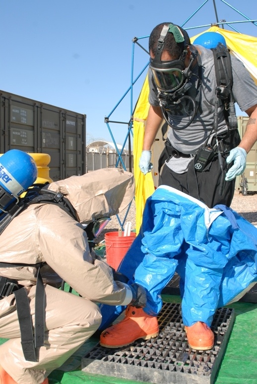 Soldier Undergoes Decontamination Training in Iraq