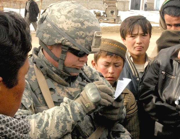 U.S. Army Officer Engages with Afghan Villagers in Parwan Province