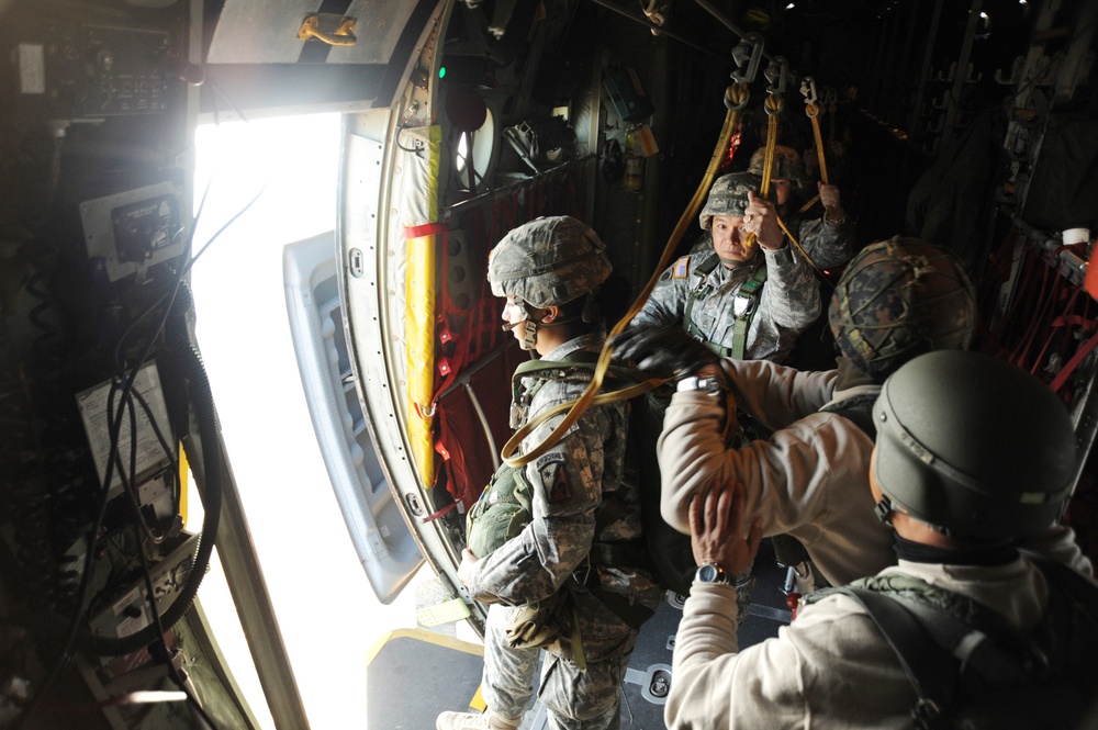 Paratrooper Waits for Green Light in Annual Toy Drop Event