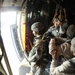 Paratrooper Waits for Green Light in Annual Toy Drop Event