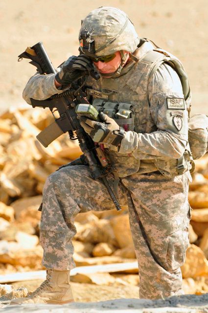 U.S. Army Officer Relays Grid Coordinates from Afghanistan Patrol
