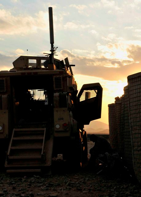 U.S. Soldier Takes Break After Guard Duty in Afghanistan
