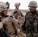 Marine Instructs Afghan Soldier on Firing Stance at Forward Operating Base in Afghanistan