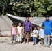 Salvadoran Family Surveys Flood Damage to Home