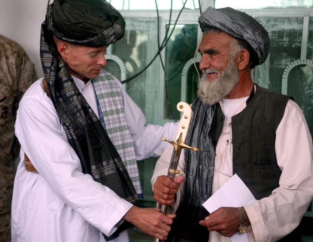 Marine Officer Presents Afghan Leader with Ceremonial Sword