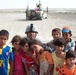 Iraqi Children Sing for U.S. Soldier in Harbi Village